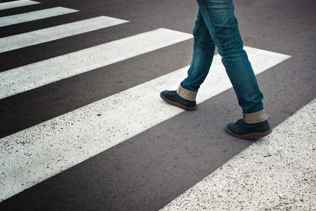 Pedestrian Accident Lawyer Burbank, CA - legs in jeans on road crosswalk