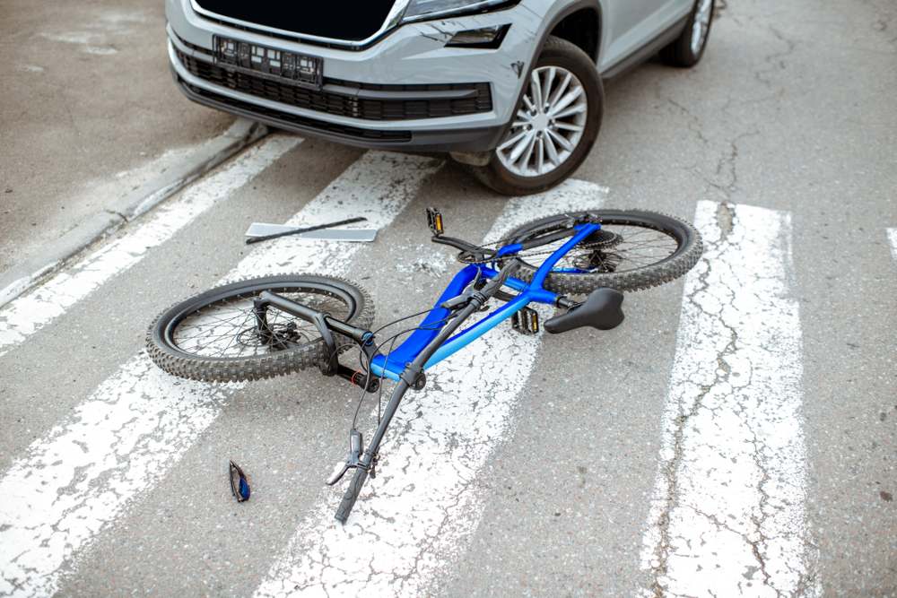 Bicycle knocked over in a crosswalk after being struck by a car in Los Angeles