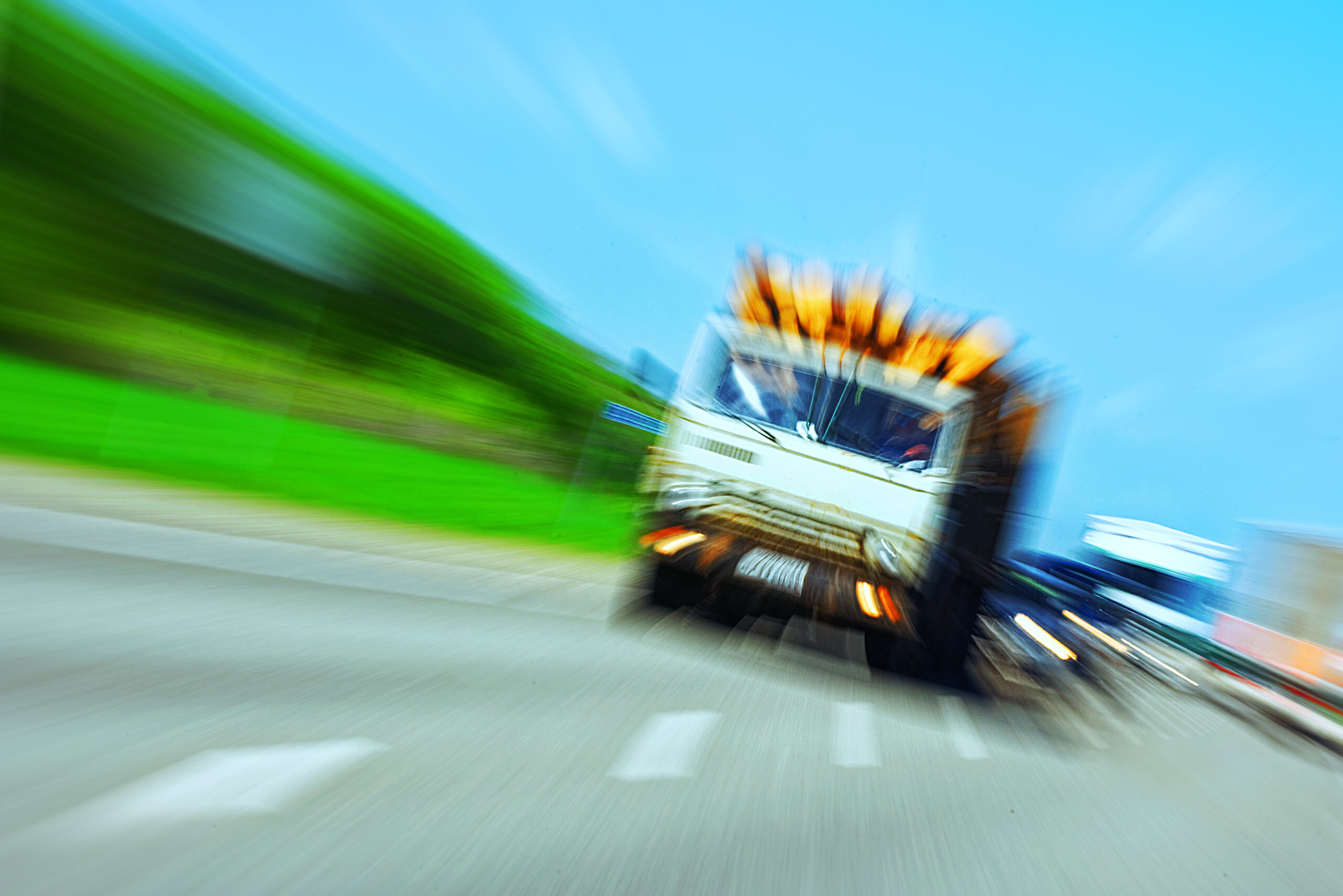 A speeding truck moves down a highway in a scenario handled by Anaheim truck accident lawyers.